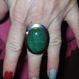 Size 7 stainless steel cuff ring with large oval green stone